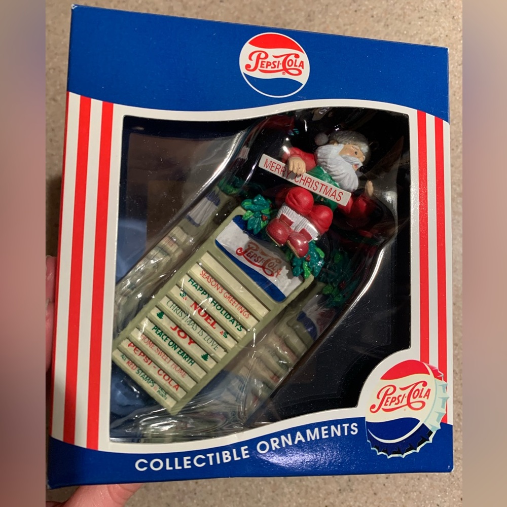 1997 Pepsi Cola Santa sitting on a Sign ornament